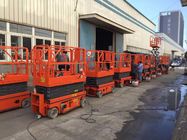 Ascensore idraulico di forbici del carico 320KG di sicurezza con colore arancio di altezza di lavoro 13.8m